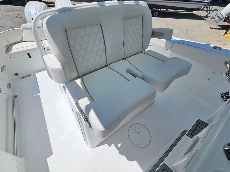 Slide: The Image of Luxury seating on 2026 Sea Hunt Ultra 275 SE boat, featuring plush white upholstery. - 20