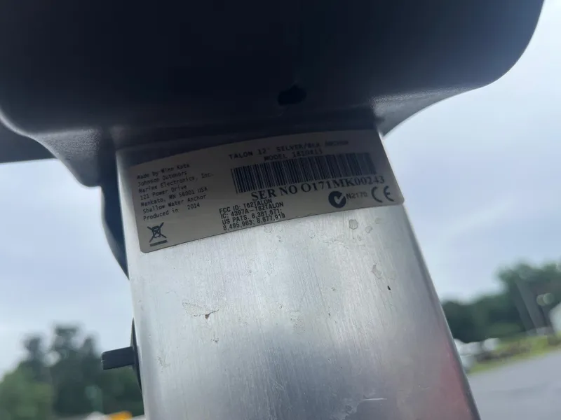 Slide: The Image of Label on Minn Kota Talon shallow water anchor, produced in 2014, with serial number and certifications. - 13