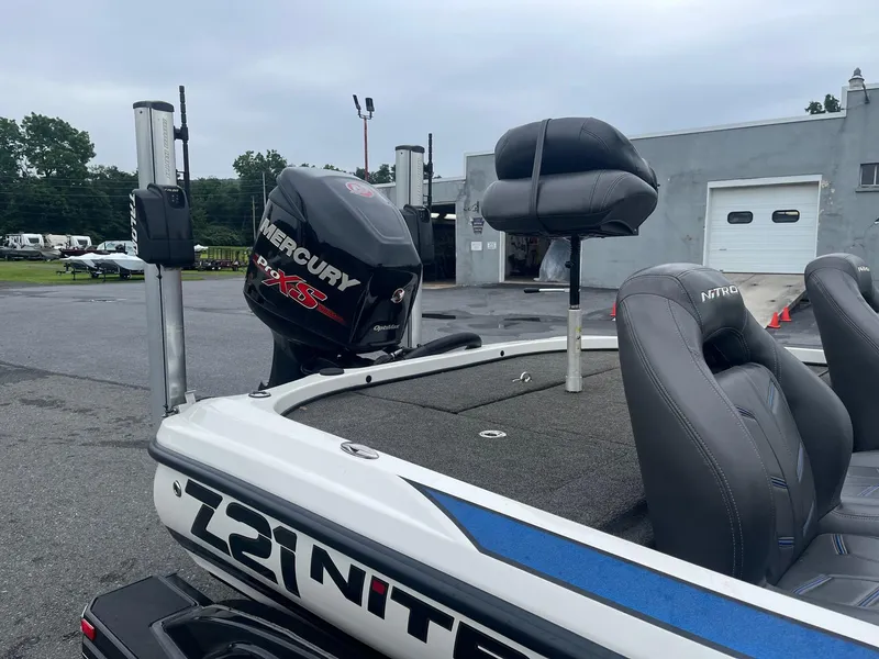 Slide: The Image of 2015 Nitro Z21 Z-Pro High Performance boat with Mercury Pro XS engine, parked outdoors. - 5