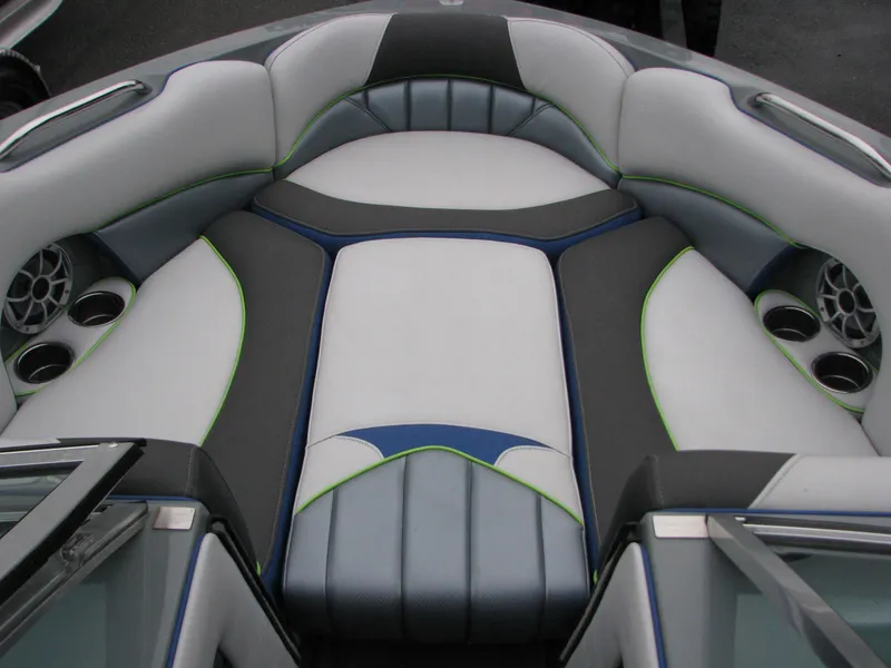 Slide: The Image of 2014 MB B-52 23 Widebody boat interior with stylish seating and cup holders. - 6