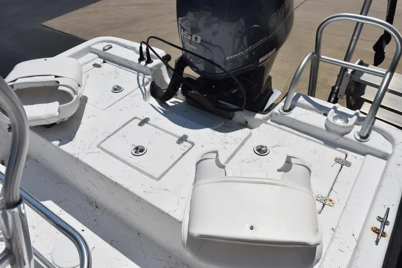 Slide: The Image of 2013 Blazer Bay 2170 boat deck with Yamaha motor and seating. - 10