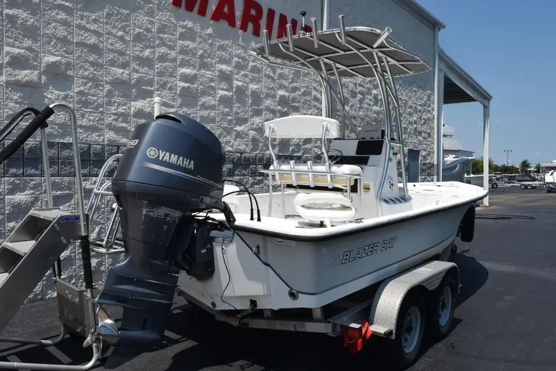 Slide: The Image of 2013 Blazer Bay 2170 boat with Yamaha engine on a trailer. - 4