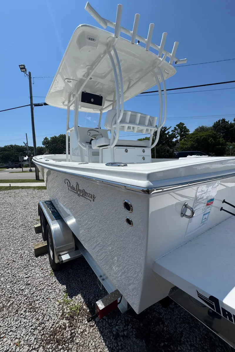 Slide: The Image of 2026 Pair Customs 21 Center Console MV boat on trailer, white exterior, sunny day. - 6