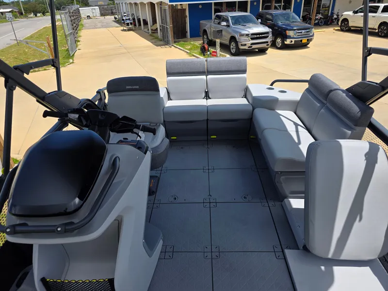 Slide: The Image of 2025 Sea-Doo Switch Compact Sport boat interior with spacious seating and modern design. - 7