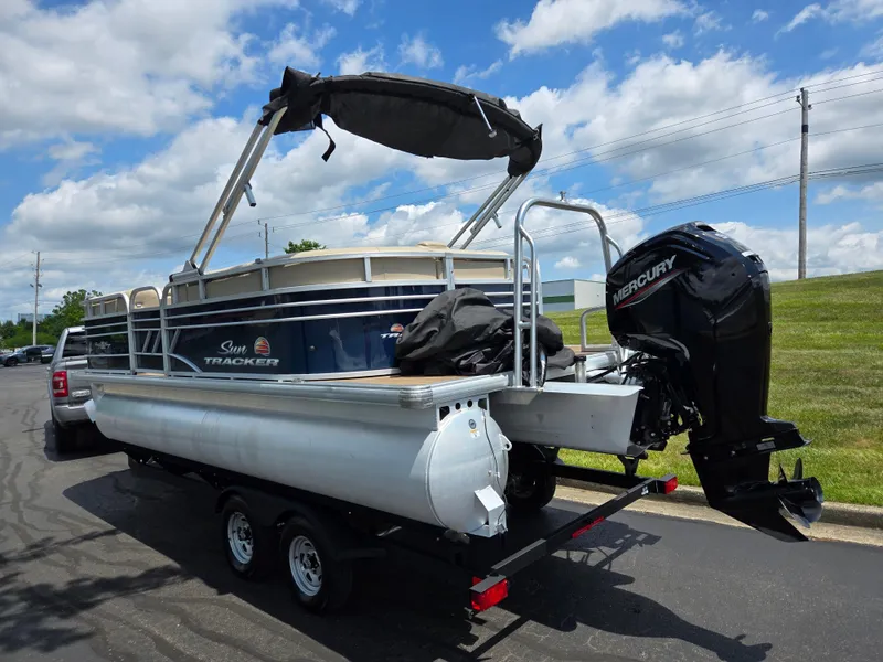 Slide: The Image of 2022 Sun Tracker Party Barge 20 DLX pontoon boat with Mercury outboard motor. - 3