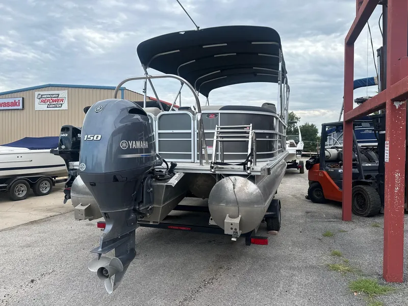 Slide: The Image of 2022 South Bay 222RS LE pontoon boat with Yamaha 150 engine at a dealership. - 3