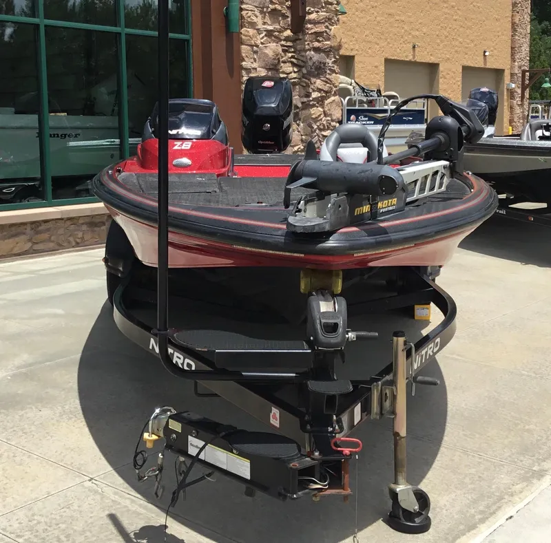 Slide: The Image of 2013 Nitro Z8 boat on trailer, equipped with Minn Kota trolling motor. - 3