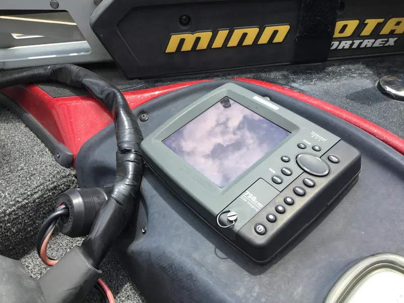 Slide: The Image of Fishfinder device on a 2013 Nitro Z8 boat with Minn Kota motor. - 8