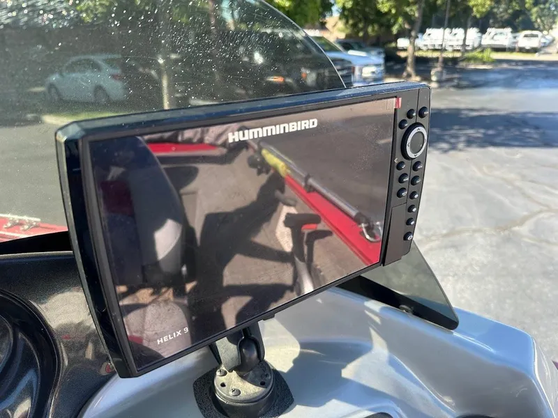 Slide: The Image of Humminbird Helix 9 fish finder on 2013 Tracker Pro Guide V-175 SC boat. - 19