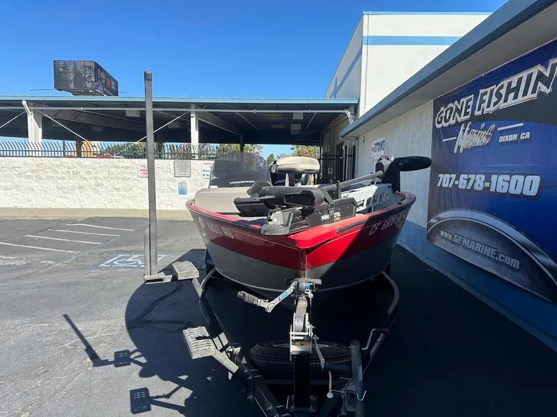 Slide: The Image of 2013 Tracker Pro Guide V-175 SC boat on trailer at dealership. - 2