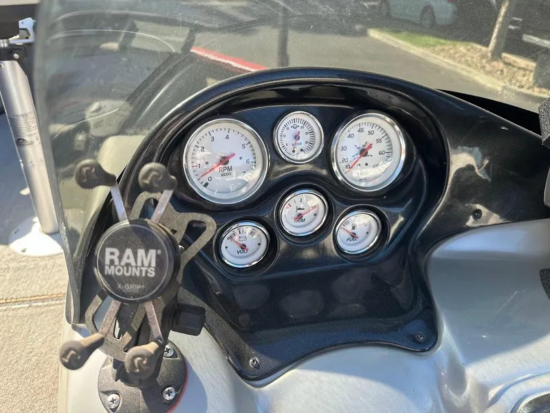 Slide: The Image of Dashboard of 2013 Tracker Pro Guide V-175 SC boat with gauges and RAM mount. - 20
