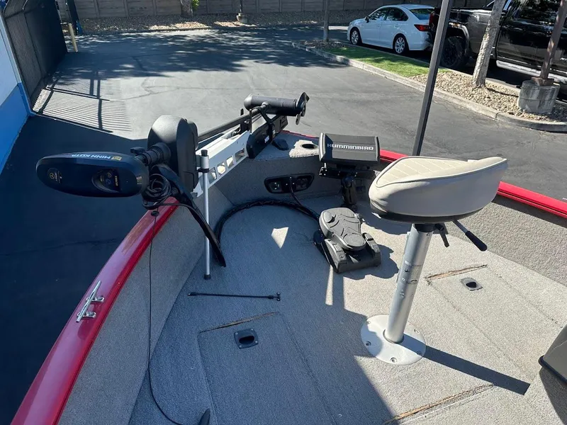 Slide: The Image of 2013 Tracker Pro Guide V-175 SC boat interior with fishing seat and equipment. - 22