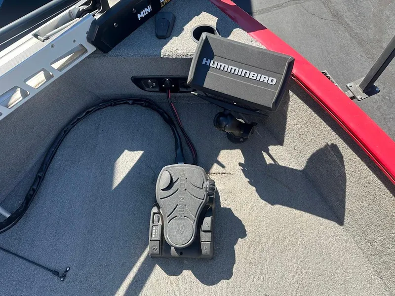 Slide: The Image of 2013 Tracker Pro Guide V-175 SC boat with Humminbird fish finder and Minn Kota foot pedal. - 25