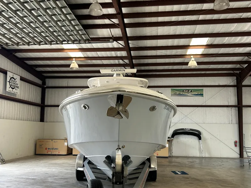 Slide: The Image of 2022 Everglades 365 Center Console boat in a warehouse, front view. - 4