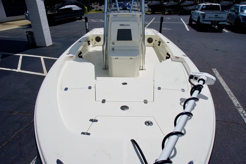 Slide: The Image of 2026 Pathfinder 2200 TRS boat with Garmin equipment in a parking lot. - 5
