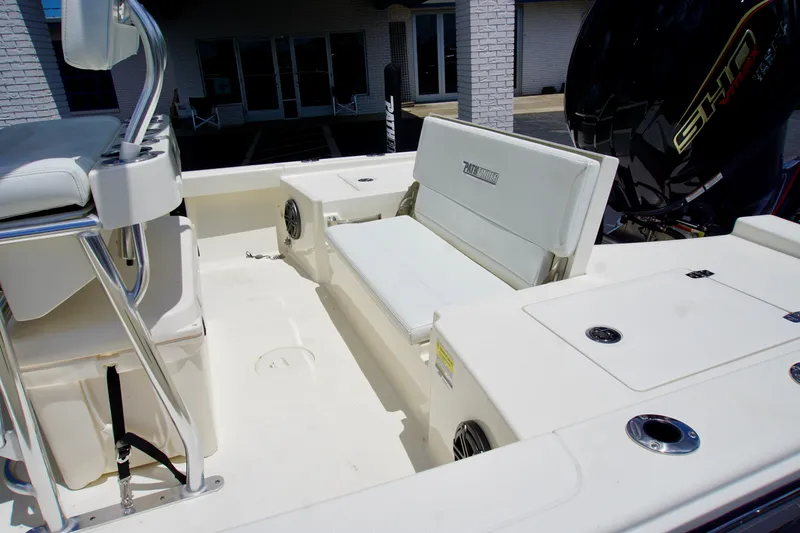 Slide: The Image of 2026 Pathfinder 2200 TRS boat interior with seating and motor, showcasing modern design. - 6