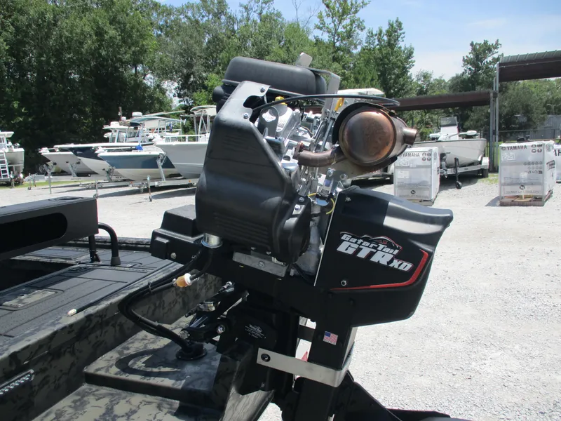 Slide: The Image of 2024 Gator Tail 1860 Extreme CC boat engine in outdoor setting. - 9