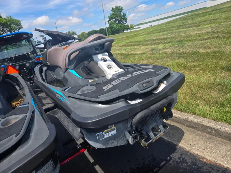 Slide: The Image of 2016 Sea-Doo GTX Limited iS 260 jet ski on trailer, parked on roadside. - 3