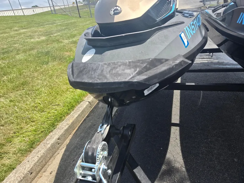 Slide: The Image of 2016 Sea-Doo GTX Limited iS 260 on trailer, parked on asphalt near grass. - 6