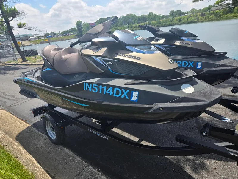Slide: The Image of 2016 Sea-Doo GTX Limited iS 260 jet ski on trailer by a lake. - 8