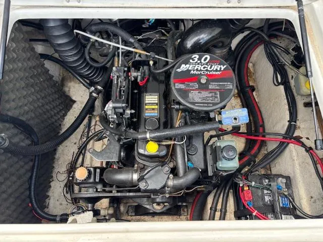 Slide: The Image of Engine compartment of a 2006 Tahoe Q4 Sport Fish with a 3.0L MerCruiser engine. - 18