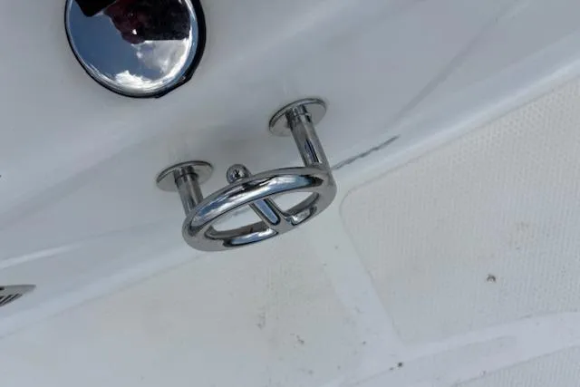 Slide: The Image of Chrome cleat on 2006 Tahoe Q4 Sport Fish boat deck. - 24