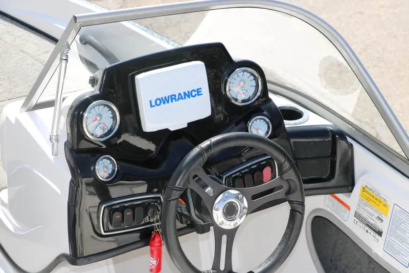 Slide: The Image of Dashboard of 2017 Nitro Z19 Sport boat with Lowrance display and gauges. - 11