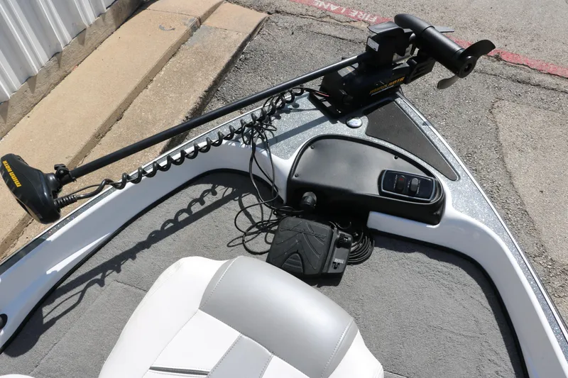 Slide: The Image of 2017 Nitro Z19 Sport boat with trolling motor and control panel on deck. - 16