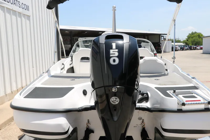 Slide: The Image of 2017 Nitro Z19 Sport boat with 150 horsepower engine, docked outdoors. - 24