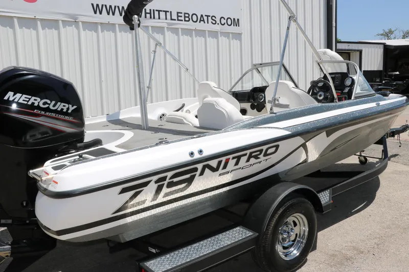 Slide: The Image of 2017 Nitro Z19 Sport boat with Mercury engine on trailer at dealership. - 25