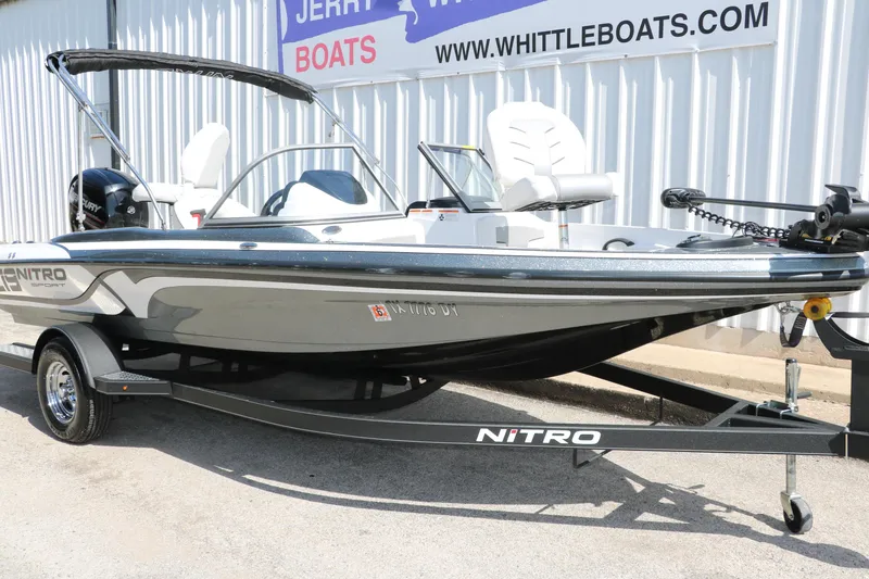 Slide: The Image of 2017 Nitro Z19 Sport boat on trailer at dealership, featuring sleek design and modern features. - 4