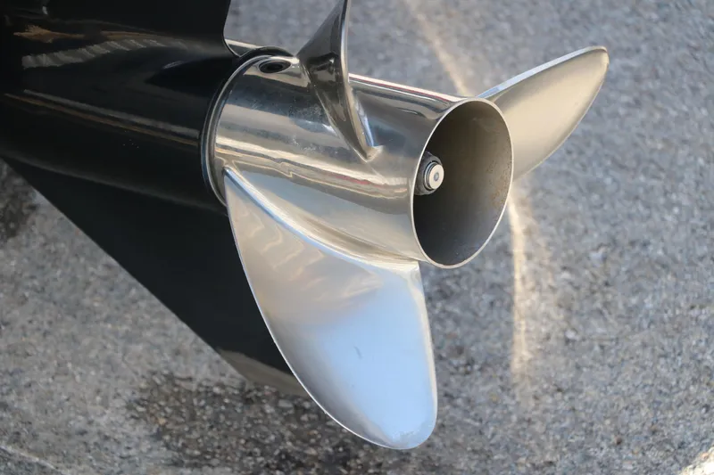 Slide: The Image of Close-up of a 2017 Nitro Z19 Sport boat propeller on pavement. - 9