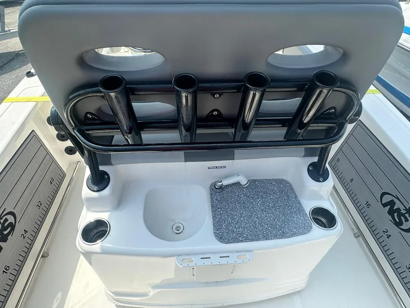 Slide: The Image of 2023 NauticStar 251 Hybrid boat deck with seating and storage compartments. - 23