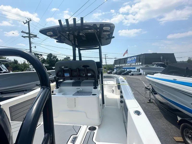 Slide: The Image of 2023 NauticStar 251 Hybrid boat with rod holders and sink station. - 28