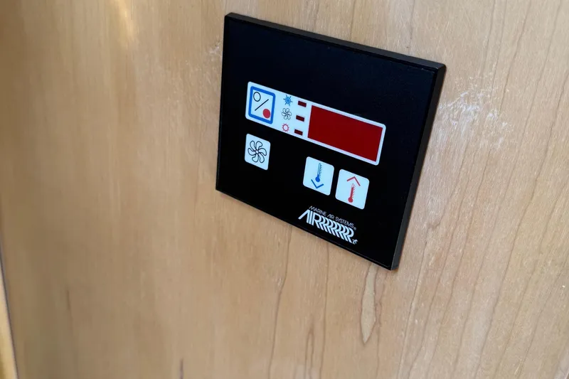 Slide: The Image of Control panel on 1995 Carver 325 Aft Cabin boat, featuring Marine Air Systems. - 16