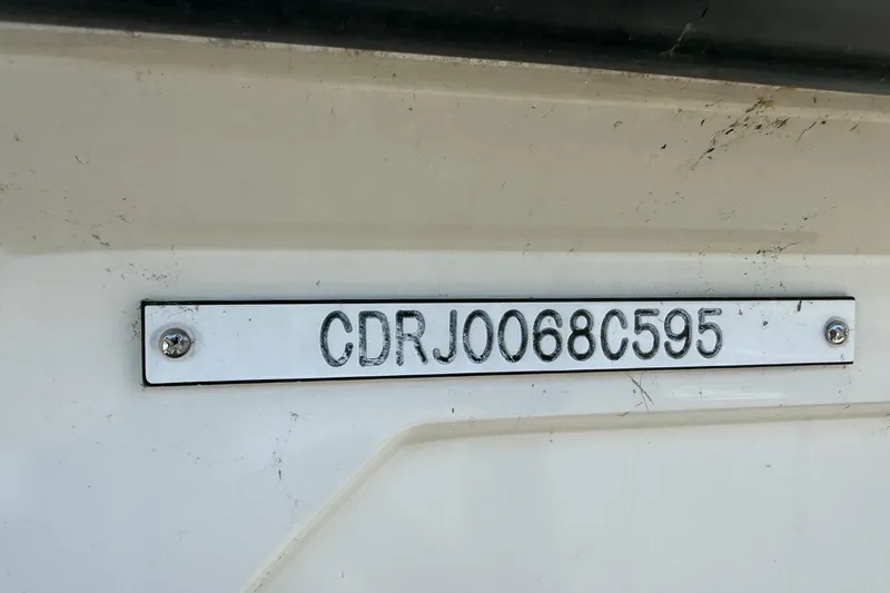 Slide: The Image of 1995 Carver 325 Aft Cabin boat identification plate with serial number. - 21