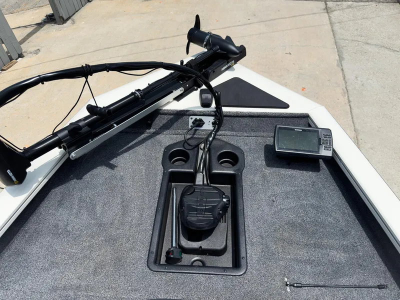 Slide: The Image of 2024 Tracker Pro Team 175 TXW boat deck with trolling motor and fish finder. - 12