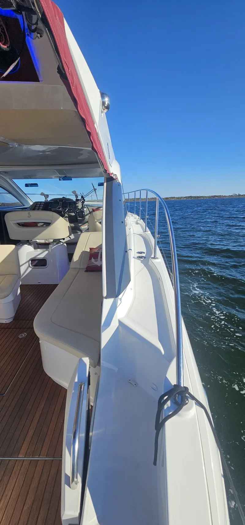 Slide: The Image of 2015 Beneteau 38 Gran Tourismo yacht on open water, sunny day, side view. - 14