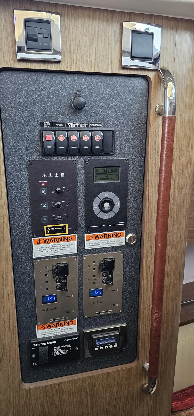 Slide: The Image of Control panel of a 2015 Beneteau 38 Gran Tourismo yacht with warning labels. - 15