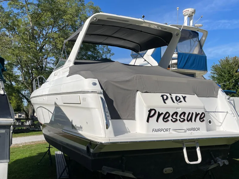 Slide: The Image of 1999 Wellcraft 3600 Martinique boat named "Pier Pressure" docked at Fairport Harbor. - 20
