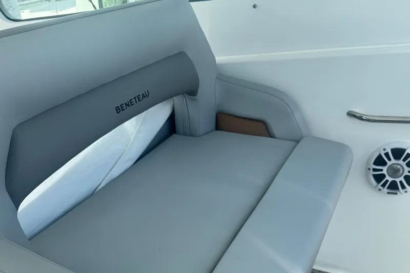 Slide: The Image of 2023 Beneteau Gran Turismo 32 interior seating with speaker and handrail. - 20