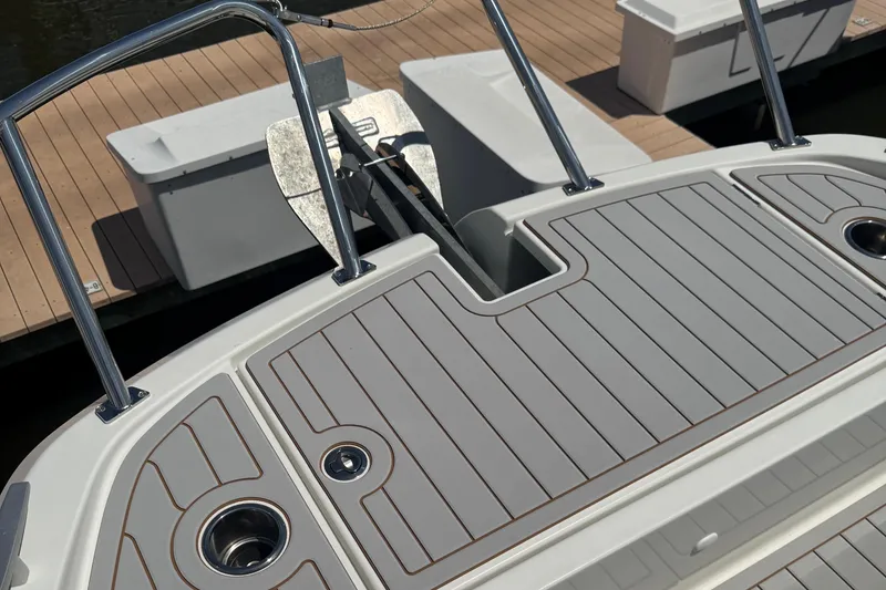 Slide: The Image of 2023 Beneteau Gran Turismo 32 swim platform with stainless steel railings and anchor. - 32