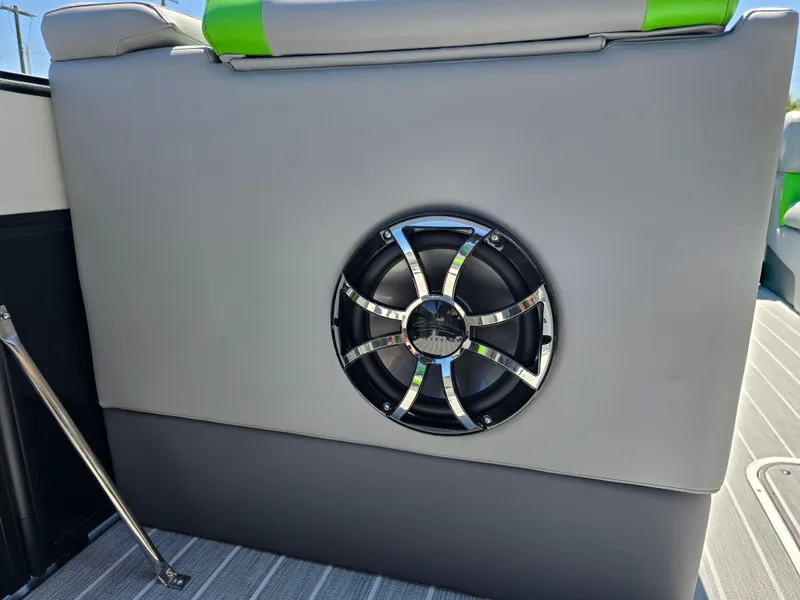 Slide: The Image of Speaker on 2026 Berkshire STS 25 RFX 3.0+ boat, gray and green interior. - 19