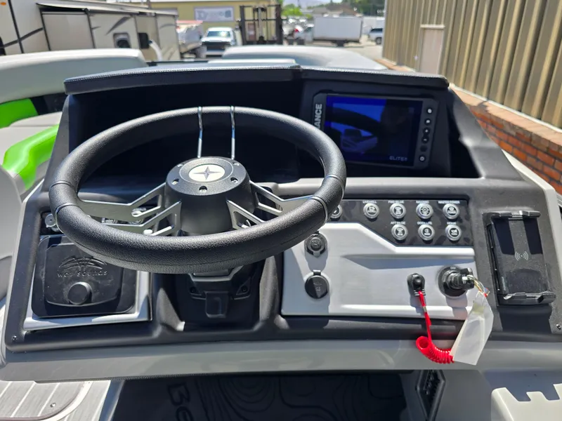 Slide: The Image of Steering console of 2026 Berkshire STS 25 RFX 3.0+ with control panel and display. - 20