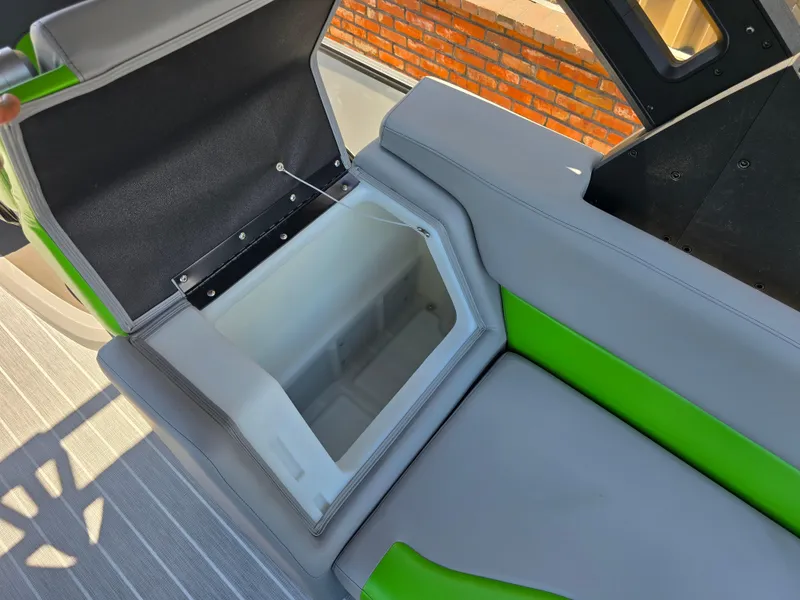Slide: The Image of Open storage compartment in 2026 Berkshire STS 25 RFX 3.0+ boat seat. - 34