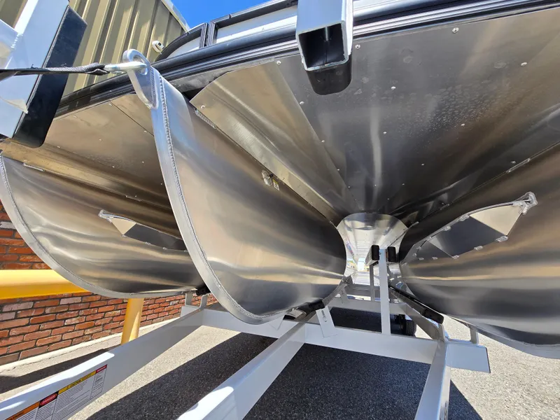 Slide: The Image of Underneath view of 2026 Berkshire STS 25 RFX 3.0+ pontoon boat on trailer. - 4