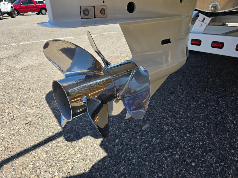 Slide: The Image of Shiny propeller of 2026 Berkshire STS 25 RFX 3.0+ on a boat trailer. - 9