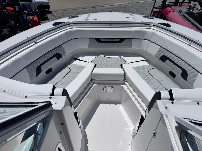 Slide: The Image of Luxurious seating area on 2026 Blackfin 272 DC boat, featuring sleek white upholstery. - 21