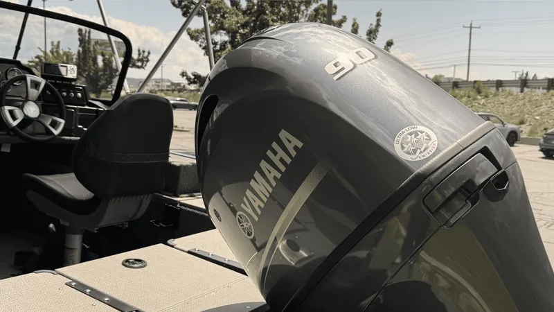 Slide: The Image of 2024 G3 Angler V178 F boat with Yamaha 90 outboard motor in parking lot. - 10