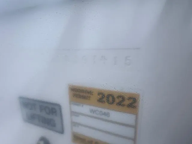 Slide: The Image of 2015 Regulator 23 Forward Seating boat with 2022 inspection sticker. - 13